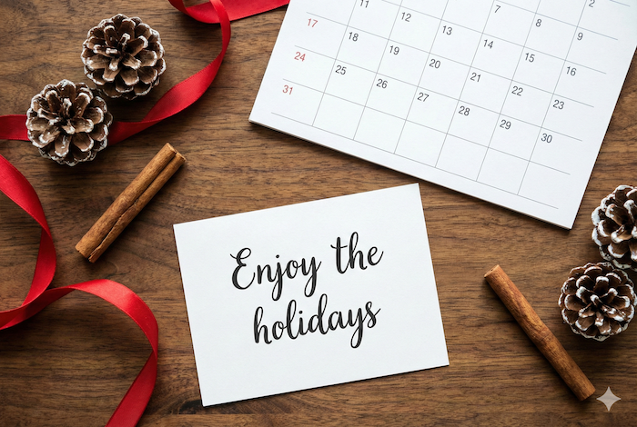 Festive flat lay with holiday card. ホリデーカードと装飾のフラットレイ。