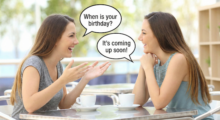 Women chatting using English birthday phrases. / 英語で誕生日を話す女性たち。