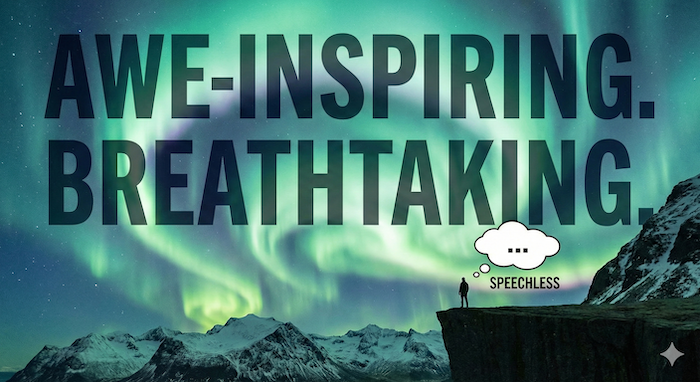 Person on a cliff viewing a massive aurora borealis. / オーロラを見上げる崖の上の人物。